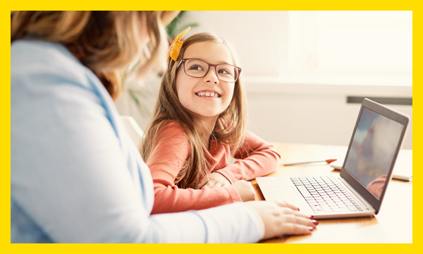 Young girl using laptop