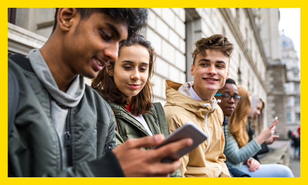 Young people looking at phone