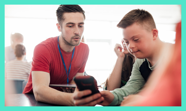 Man and child using phone